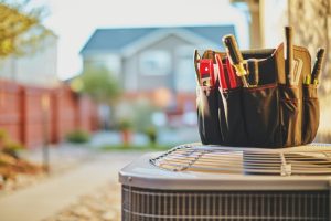 ac-tools-sitting-on-top-of-outdoor-ac-unit