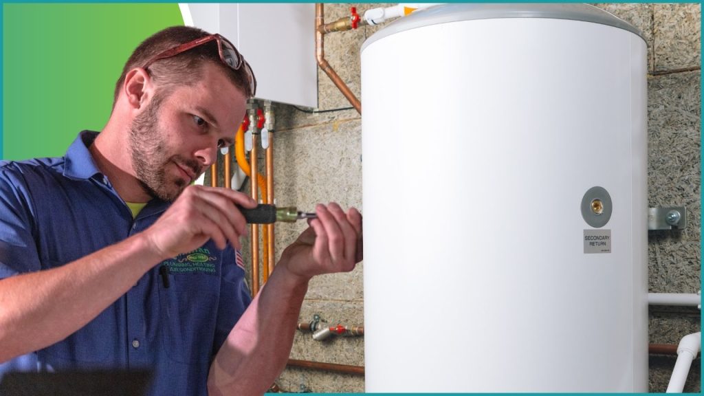 A Kennihans tech working on a water heater.