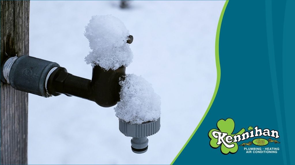 A frozen outdoor spigot.