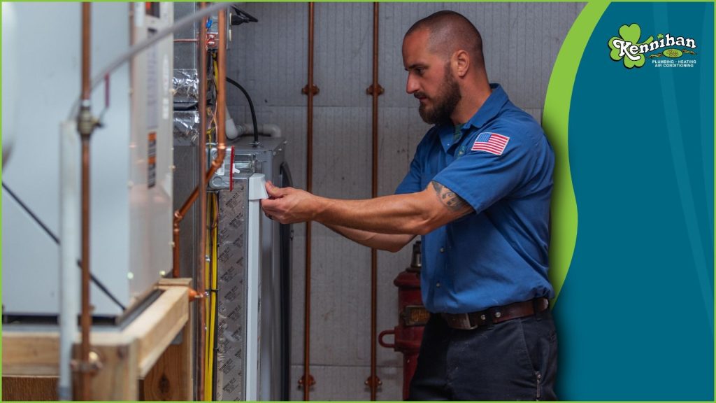 An HVAC tech installing a gas furnace.
